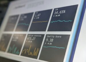 Operations staff reconciling trade records on multiple screens
