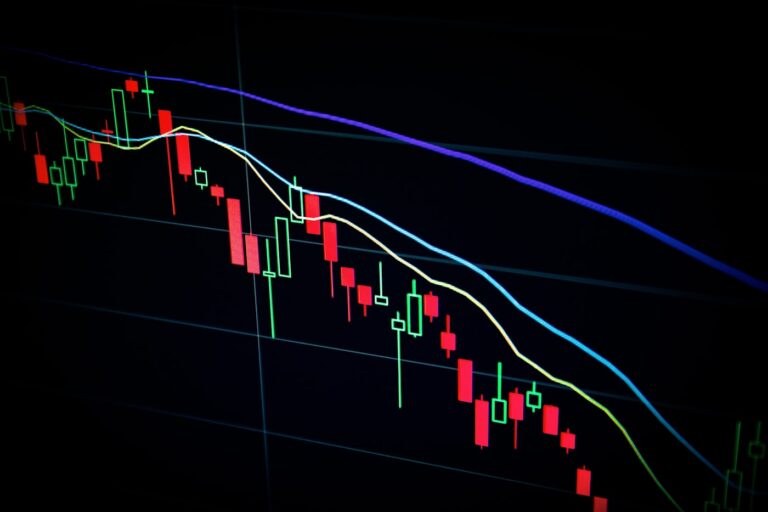 Institutional trading desk with market data monitors